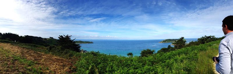 Scenic view of sea against cloudy sky