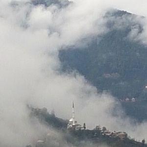 Aerial view of city against sky