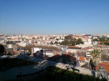 High angle shot of townscape against clear blue sky