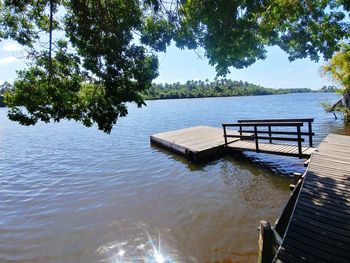 Pier over lake against sky