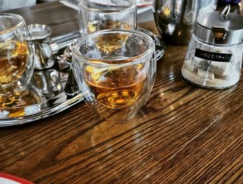 High angle view of wine in glass on table