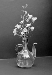 Close-up of flower vase on table