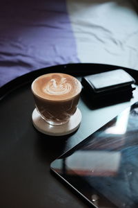 High angle view of coffee cup on table