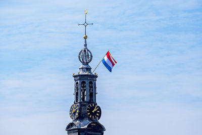 The munt tower in amsterdam the netherlands at kings day