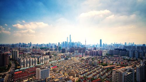 High angle view of modern buildings against sky in city