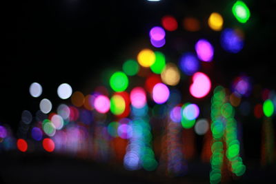 Defocused image of illuminated lights at night
