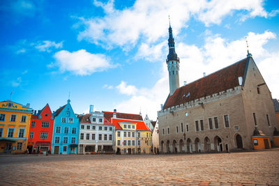 View of buildings in city against sky