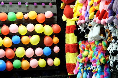 Multi colored toys for sale at market