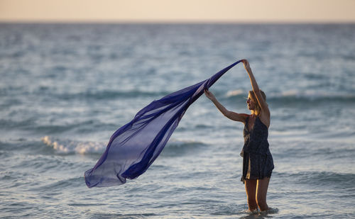 A woman poses