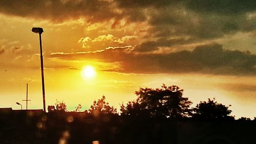 Scenic view of dramatic sky during sunset