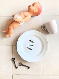 High angle view of baby boy on table at home