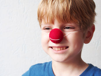 Close-up portrait of smiling boy