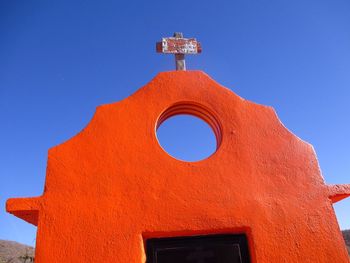 Low angle view of church against blue sky