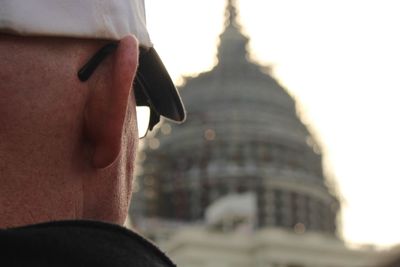 Close-up portrait of man against blurred background