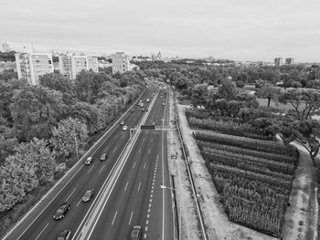 High angle view of road in city against sky