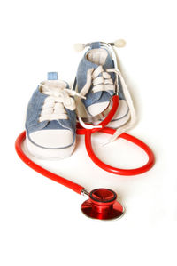 Close-up of shoes against white background