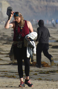 Full length of woman photographing