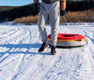 Rear view of man skiing on snow