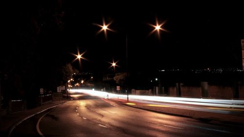 Light trails on road at night