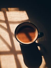 High angle view of coffee cup on table