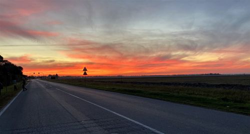 Road against sky during sunset