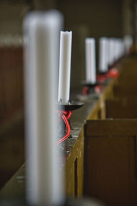 Old church candle row at the benches 