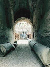 People walking in tunnel