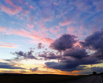 Low angle view of dramatic sky during sunset