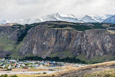 Scenic view of landscape and mountains against sky