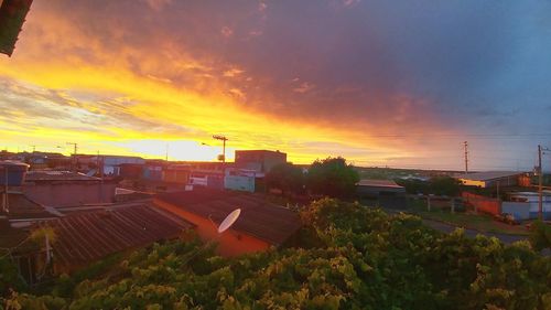 View of city against sky during sunset