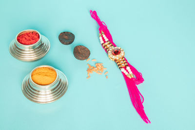 High angle view of cake on table against blue background