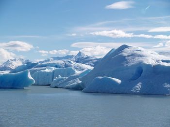 Scenic view of frozen lake against sky