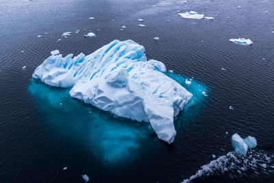 High angle view of ice floating on sea