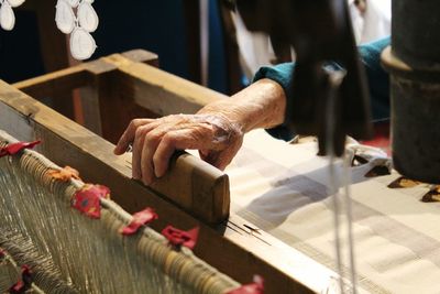 Close-up of old fashioned fabric loom