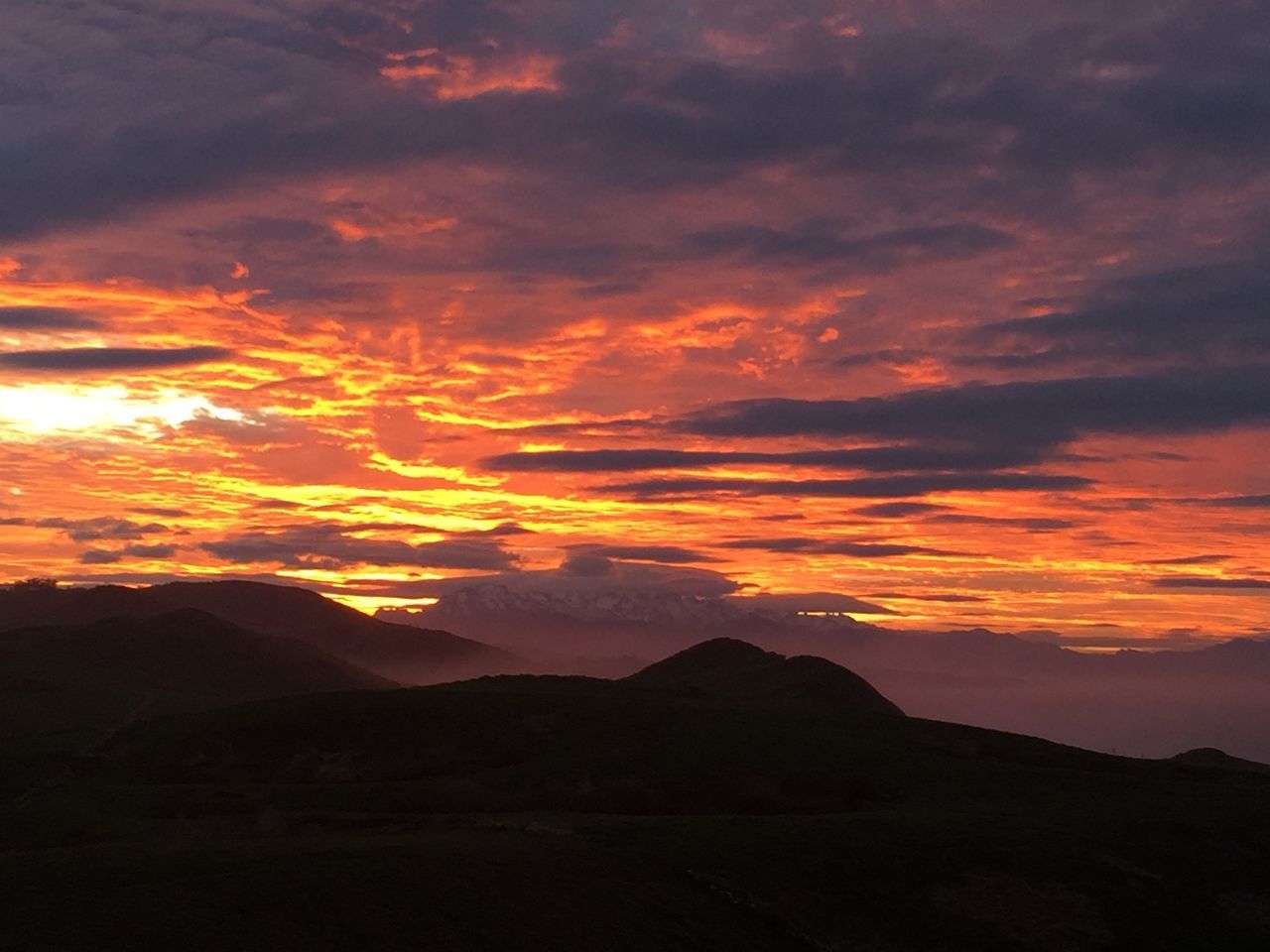 sky, sunset, beauty in nature, scenics - nature, mountain, cloud - sky, tranquil scene, tranquility, idyllic, orange color, nature, mountain range, silhouette, non-urban scene, no people, landscape, environment, outdoors, land, dramatic sky, mountain peak, romantic sky