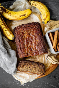 Home made banana bread rustic flat lay fresh ingredients honey eggs