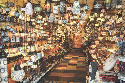 Illuminated market stall for sale in store