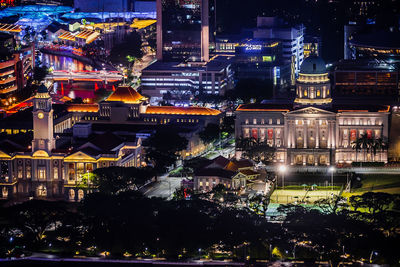 High angle view of buildings at night