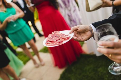 Midsection of man preparing food