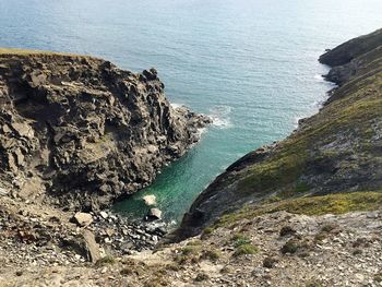 High angle view of rock formations in sea 