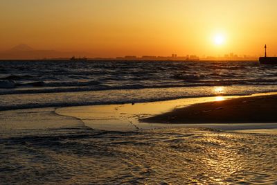 Scenic view of sea at sunset