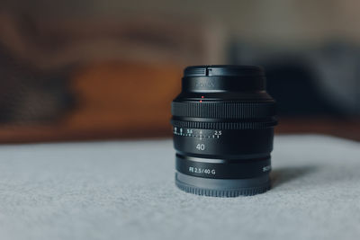 Close-up of camera on table