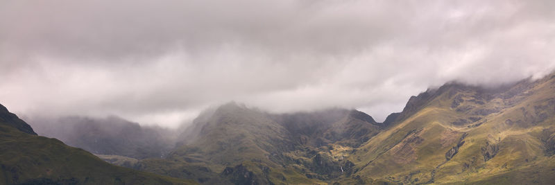 Panoramic view of mountains against sky