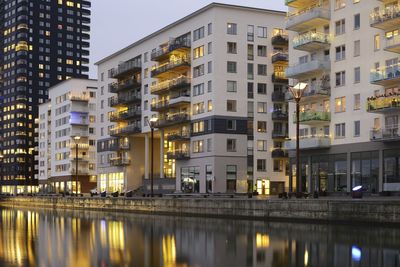 Illuminated buildings in city at night