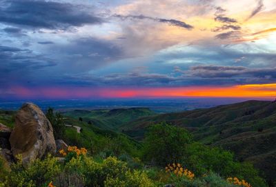 Scenic view of landscape against sky during sunset