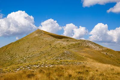 Low angle view of arid landscape against sky in ussita, marche italy