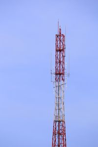 Low angle view of communications tower against clear sky