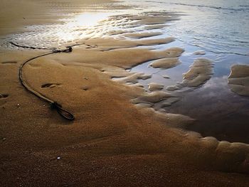 Scenic view of beach against sky during sunset