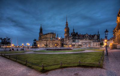 Illuminated buildings in city at night