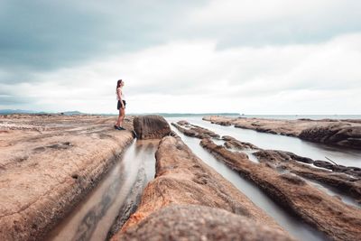 Woman by the beach